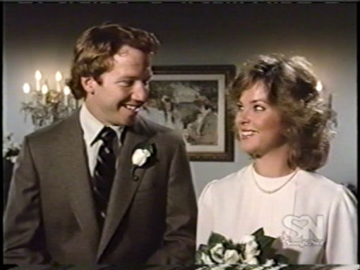 Melissa Sue Anderson and Timothy Busfield in Hotel (1985)
